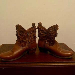 Cute brown genuine leather booties w/ decorative leather flowers.